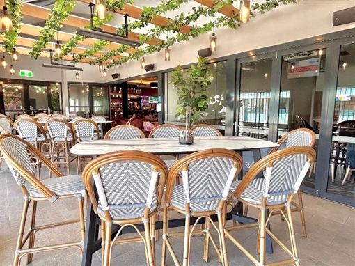 The Great Western Verandah, with high-bar tables and stools